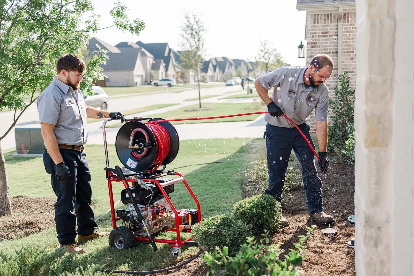 Underwood plumbers feeding a sewer cable
