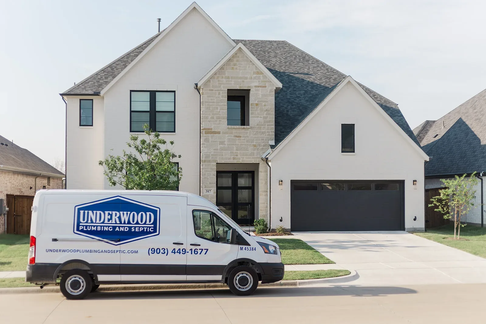 Underwood Plumbing and Septic van in a driveway